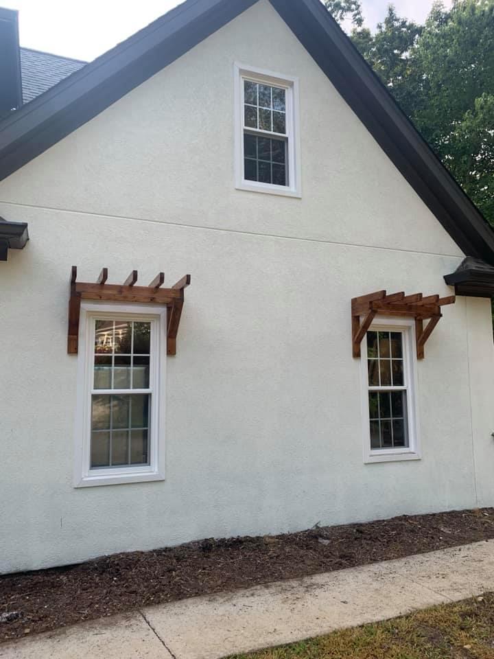 Trellis sheds over windows 