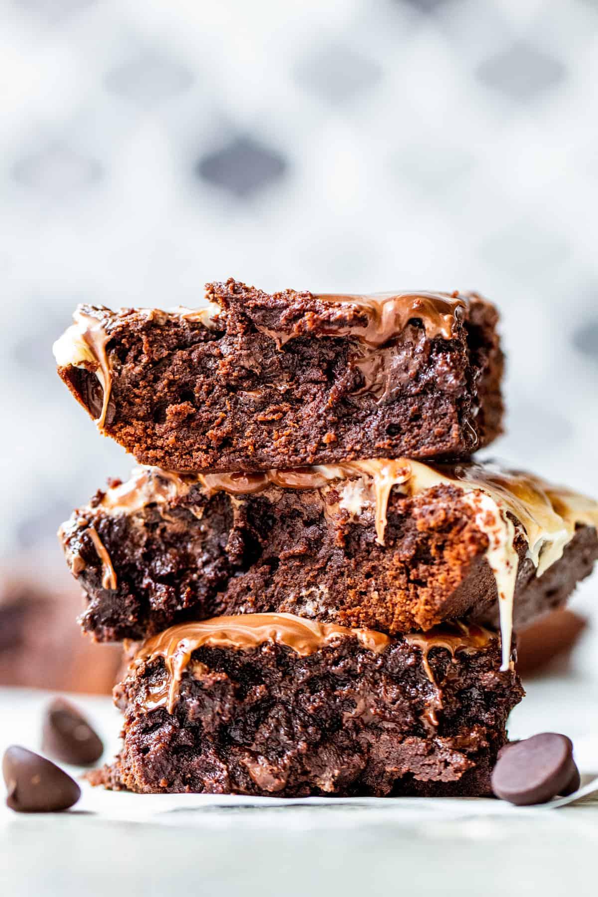 Strait on shot of fudge brownies in stack of three.