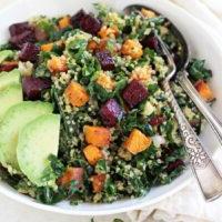 Kale and quinoa rainbow salad! This vibrant & healthy salad is packed with roasted veggies, almond quinoa pilaf and massaged kale! With a creamy lemon dressing!