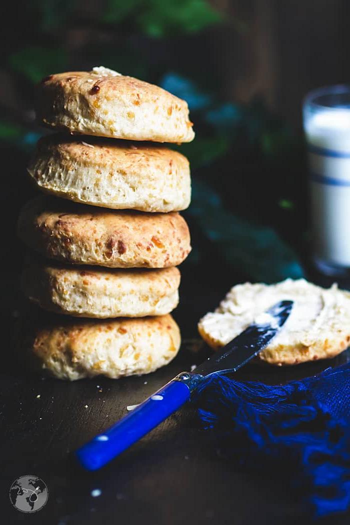 Five homemade biscuits stacked on top of each other.