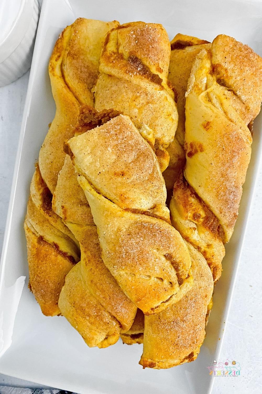 Pumpkin pie pastry strips on a serving plate